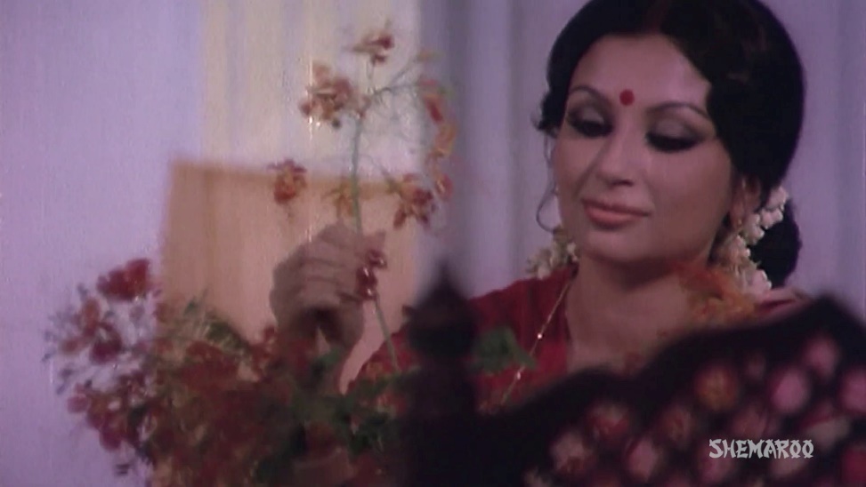A person holding a flower

AI-generated content may be incorrect.