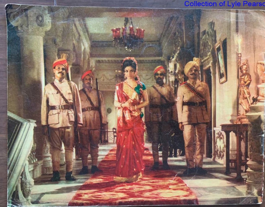 A person in a red dress standing in a hallway with several men in uniform

AI-generated content may be incorrect.