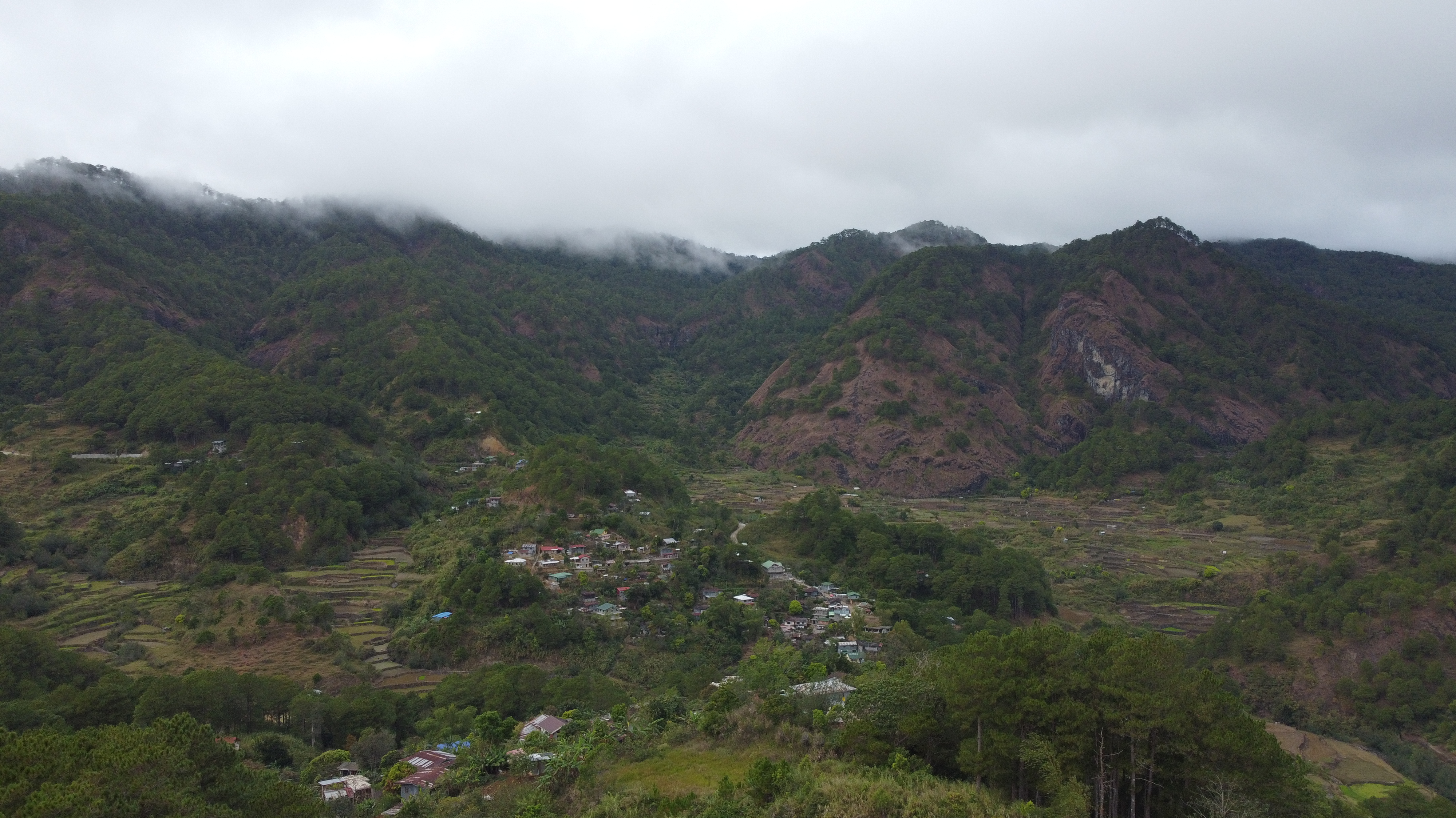 Village of Bauko at the base of the mountains.