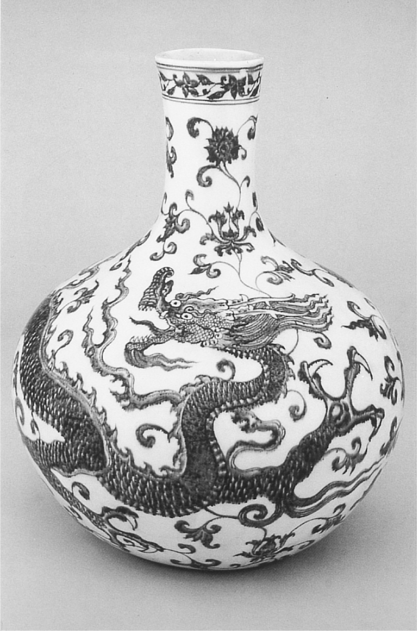 A photograph of a vase with a narrow neck and round body, elaborately painted with a large dragon along with smaller flames and flowers on a white background.