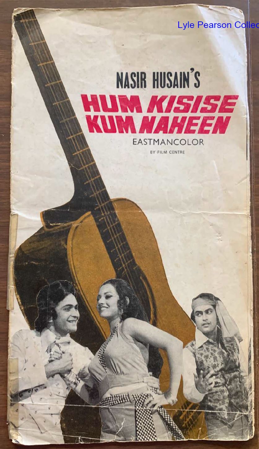 A poster with a guitar and people on it

AI-generated content may be incorrect.