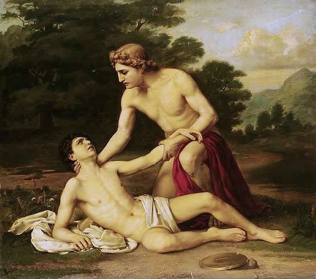 The image shows Apollo, recognizable by his red cape and blonde hair, cradling Hyacinth as he lies in pain and dying with blood coming out of his head. Beside Apollo's feet is the gold discus which caused Hyacinth's death. Apollo looks down on him with guilt and sorrow. They are outside and behind them are trees and mountains.