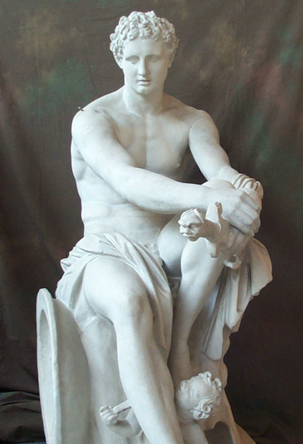 Ares sitting with child Eros next to his feet. Ares hands both held forward on a sheathed sword.